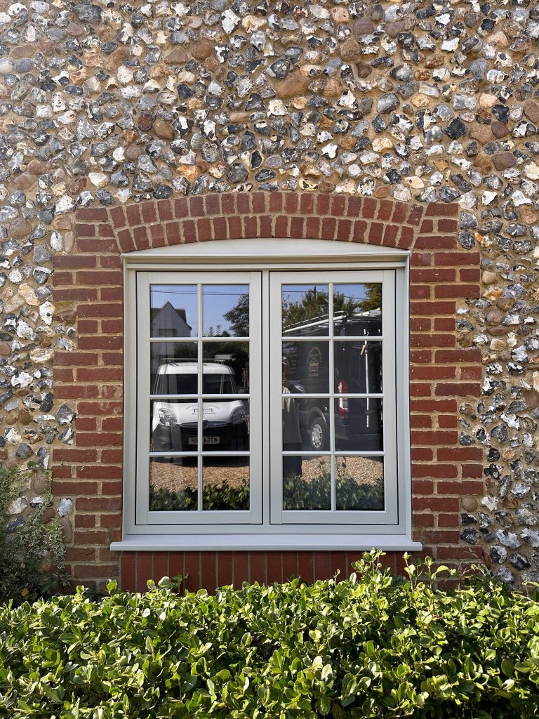 White Timberlook flush sash window with180mm cill , astragal bars and concealed trickle vents